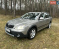 Бежевий Шкода Octavia Scout, об'ємом двигуна 2 л та пробігом 247 тис. км за 10999 $, фото 1 на Automoto.ua