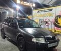 Черный Шкода Октавия Скаут, объемом двигателя 1.9 л и пробегом 400 тыс. км за 1894 $, фото 1 на Automoto.ua