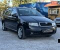 Черный Шкода Октавия Скаут, объемом двигателя 1.4 л и пробегом 200 тыс. км за 5500 $, фото 1 на Automoto.ua