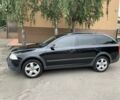 Черный Шкода Октавия Скаут, объемом двигателя 2 л и пробегом 296 тыс. км за 7300 $, фото 1 на Automoto.ua