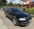 Чорний Шкода Octavia Scout, об'ємом двигуна 2 л та пробігом 230 тис. км за 6299 $, фото 1 на Automoto.ua