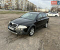 Чорний Шкода Octavia Scout, об'ємом двигуна 2 л та пробігом 241 тис. км за 6000 $, фото 1 на Automoto.ua