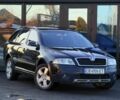 Чорний Шкода Octavia Scout, об'ємом двигуна 2 л та пробігом 227 тис. км за 6700 $, фото 1 на Automoto.ua