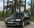 Черный Шкода Октавия Скаут, объемом двигателя 2 л и пробегом 170 тыс. км за 6999 $, фото 1 на Automoto.ua
