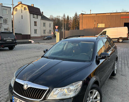 Черный Шкода Октавия Скаут, объемом двигателя 1.97 л и пробегом 210 тыс. км за 10800 $, фото 12 на Automoto.ua