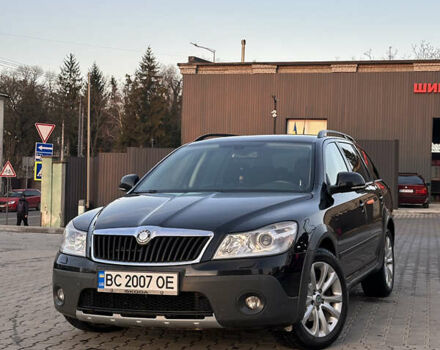 Черный Шкода Октавия Скаут, объемом двигателя 1.97 л и пробегом 210 тыс. км за 10800 $, фото 2 на Automoto.ua
