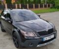 Черный Шкода Октавия Скаут, объемом двигателя 1.97 л и пробегом 241 тыс. км за 12500 $, фото 1 на Automoto.ua
