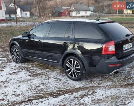 Черный Шкода Октавия Скаут, объемом двигателя 2 л и пробегом 268 тыс. км за 12222 $, фото 21 на Automoto.ua