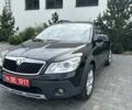 Черный Шкода Октавия Скаут, объемом двигателя 2 л и пробегом 232 тыс. км за 11537 $, фото 1 на Automoto.ua