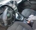 Черный Шкода Октавия Скаут, объемом двигателя 2 л и пробегом 317 тыс. км за 10700 $, фото 1 на Automoto.ua