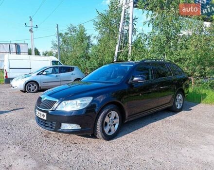 Черный Шкода Октавия Скаут, объемом двигателя 1.2 л и пробегом 156 тыс. км за 7500 $, фото 2 на Automoto.ua