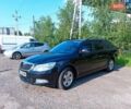 Черный Шкода Октавия Скаут, объемом двигателя 1.2 л и пробегом 156 тыс. км за 7500 $, фото 2 на Automoto.ua