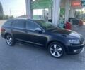 Черный Шкода Октавия Скаут, объемом двигателя 2 л и пробегом 280 тыс. км за 12950 $, фото 1 на Automoto.ua
