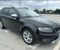 Чорний Шкода Octavia Scout, об'ємом двигуна 2 л та пробігом 257 тис. км за 11390 $, фото 1 на Automoto.ua