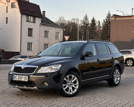 Черный Шкода Октавия Скаут, объемом двигателя 1.97 л и пробегом 210 тыс. км за 10800 $, фото 1 на Automoto.ua