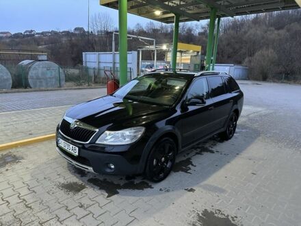 Чорний Шкода Octavia Scout, об'ємом двигуна 2 л та пробігом 220 тис. км за 9499 $, фото 1 на Automoto.ua