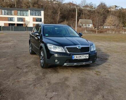 Черный Шкода Октавия Скаут, объемом двигателя 1.97 л и пробегом 253 тыс. км за 12500 $, фото 1 на Automoto.ua