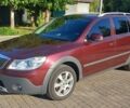 Красный Шкода Октавия Скаут, объемом двигателя 2 л и пробегом 265 тыс. км за 10300 $, фото 1 на Automoto.ua