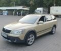 Желтый Шкода Октавия Скаут, объемом двигателя 2 л и пробегом 320 тыс. км за 10310 $, фото 1 на Automoto.ua