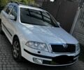 Белый Шкода Октавия, объемом двигателя 1.6 л и пробегом 235 тыс. км за 6600 $, фото 1 на Automoto.ua