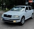 Белый Шкода Октавия, объемом двигателя 1.8 л и пробегом 205 тыс. км за 5900 $, фото 1 на Automoto.ua