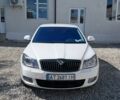 Білий Шкода Октавія, об'ємом двигуна 2 л та пробігом 237 тис. км за 9899 $, фото 2 на Automoto.ua