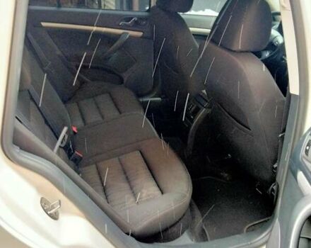 Шкода Октавия 2011 в Ирпене на Automoto.ua Белый Шкода Октавия, объемом двигателя 2 л и пробегом 299 тыс. км за 9000 $, фото 4 на Automoto.ua