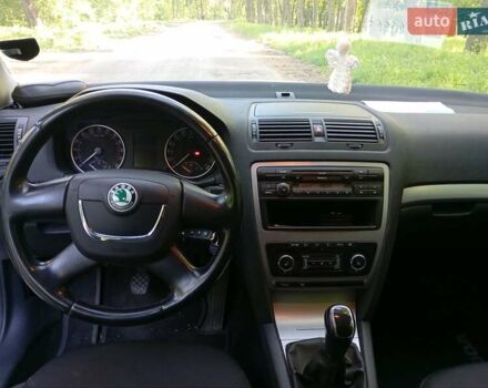 Шкода Октавия 2012 в Ирпене на Automoto.ua Белый Шкода Октавия, объемом двигателя 1.6 л и пробегом 245 тыс. км за 9000 $, фото 11 на Automoto.ua