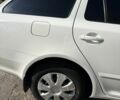 Белый Шкода Октавия, объемом двигателя 2 л и пробегом 214 тыс. км за 9532 $, фото 1 на Automoto.ua