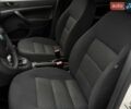Белый Шкода Октавия, объемом двигателя 1.2 л и пробегом 230 тыс. км за 6777 $, фото 10 на Automoto.ua
