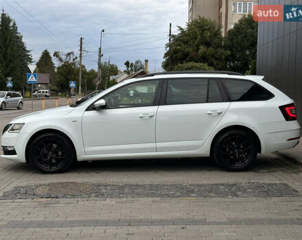 Белый Шкода Октавия, объемом двигателя 2 л и пробегом 252 тыс. км за 14999 $, фото 6 на Automoto.ua
