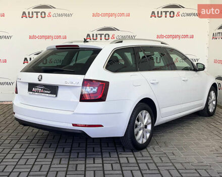 Белый Шкода Октавия, объемом двигателя 1.6 л и пробегом 209 тыс. км за 15950 $, фото 2 на Automoto.ua