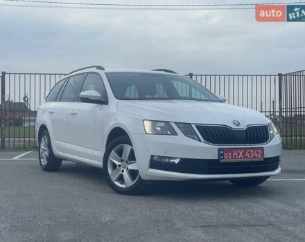 Білий Шкода Октавія, об'ємом двигуна 2 л та пробігом 218 тис. км за 13999 $, фото 1 на Automoto.ua