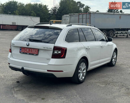 Белый Шкода Октавия, объемом двигателя 2 л и пробегом 230 тыс. км за 16550 $, фото 5 на Automoto.ua