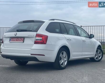 Білий Шкода Октавія, об'ємом двигуна 2 л та пробігом 218 тис. км за 13999 $, фото 34 на Automoto.ua