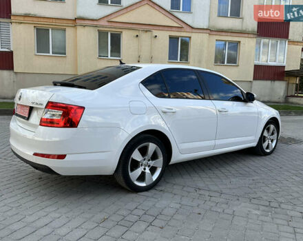 Шкода Октавия 2014 в Каменце-Подольском на Automoto.ua Белый Шкода Октавия, объемом двигателя 1.6 л и пробегом 180 тыс. км за 10800 $, фото 13 на Automoto.ua
