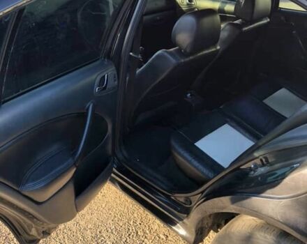 Черный Шкода Октавия, объемом двигателя 1.8 л и пробегом 440 тыс. км за 4800 $, фото 10 на Automoto.ua