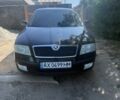 Черный Шкода Октавия, объемом двигателя 1.6 л и пробегом 480 тыс. км за 5500 $, фото 1 на Automoto.ua