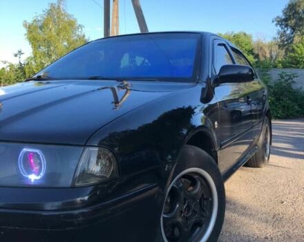 Черный Шкода Октавия, объемом двигателя 1.8 л и пробегом 440 тыс. км за 4800 $, фото 12 на Automoto.ua