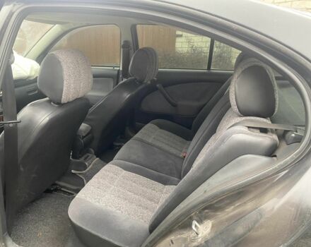 Черный Шкода Октавия, объемом двигателя 1.6 л и пробегом 201 тыс. км за 2200 $, фото 4 на Automoto.ua