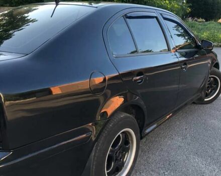 Черный Шкода Октавия, объемом двигателя 1.8 л и пробегом 440 тыс. км за 4800 $, фото 5 на Automoto.ua