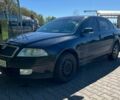 Черный Шкода Октавия, объемом двигателя 1.6 л и пробегом 331 тыс. км за 5000 $, фото 1 на Automoto.ua