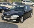 Черный Шкода Октавия, объемом двигателя 1.6 л и пробегом 260 тыс. км за 5350 $, фото 1 на Automoto.ua