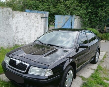 Черный Шкода Октавия, объемом двигателя 1.6 л и пробегом 230 тыс. км за 5500 $, фото 1 на Automoto.ua
