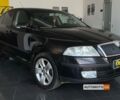 Черный Шкода Октавия, объемом двигателя 2 л и пробегом 311 тыс. км за 6000 $, фото 1 на Automoto.ua
