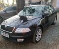 Черный Шкода Октавия, объемом двигателя 1.6 л и пробегом 208 тыс. км за 7500 $, фото 1 на Automoto.ua