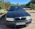 Черный Шкода Октавия, объемом двигателя 1.6 л и пробегом 272 тыс. км за 3994 $, фото 1 на Automoto.ua