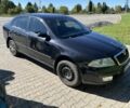 Черный Шкода Октавия, объемом двигателя 1.6 л и пробегом 331 тыс. км за 4700 $, фото 1 на Automoto.ua