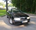 Черный Шкода Октавия, объемом двигателя 1.6 л и пробегом 230 тыс. км за 2998 $, фото 1 на Automoto.ua
