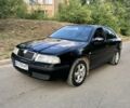Черный Шкода Октавия, объемом двигателя 1.6 л и пробегом 315 тыс. км за 4500 $, фото 1 на Automoto.ua